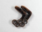 Olympijské kruhy s odznakem šípů (bronzové)